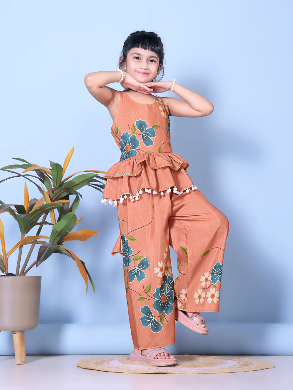 Girls Peplum Kurta Palazzo Set with Floral Print