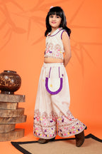 Young girl in traditional outfit with orange background